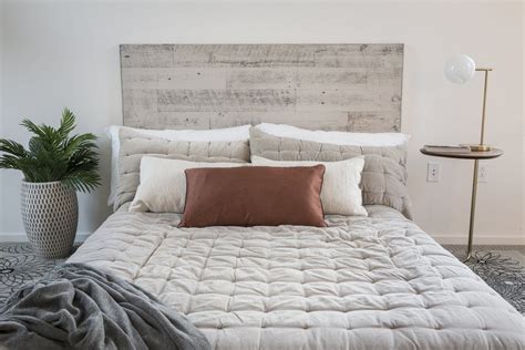 Read this guide for instructions of building a wooden headboard to go with this bed frame. Reclaimed Weathered Wood Gray Stikit Headboard | Reclaimed wood headboard, Plank headboard, Wood ...