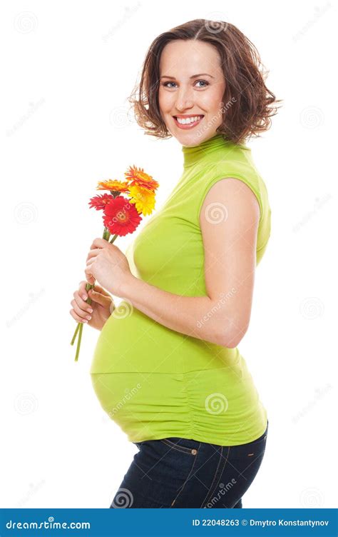 Mujer Embarazada Hermosa Con Las Flores Imagen De Archivo Imagen De
