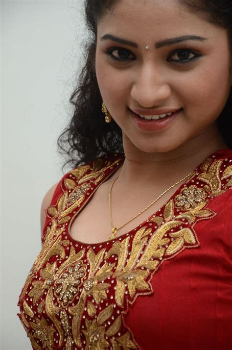 vishnu priya photos in red salwar kameez at romance telugu movie audio launch