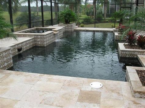 Stone pool and spa with black marble pebble tec. Pin on Pebble Tec, Pebble Sheen & Beadcrete
