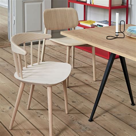 Combining dining and everyday chairs for a minimalistic styling, its sculptural profile has been created by a wide seat and light spindle structural elements. J104 Chair | Hay | Shop