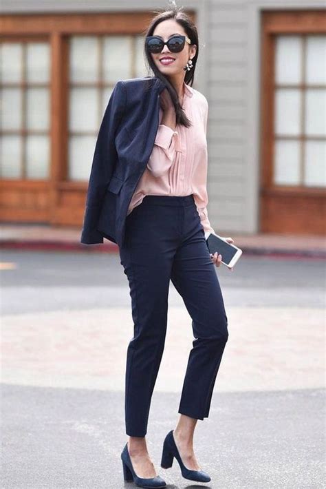 Picture Of A Navy Pantsuit With Cropped Pants A Pink