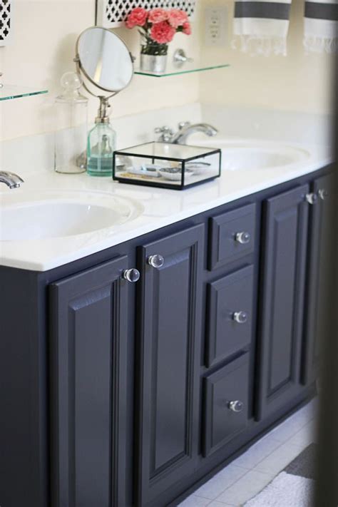 The right colour of paint can add some brightness or warmth to the room. Painted bathroom cabinets - builder grade | Bathrooms ...