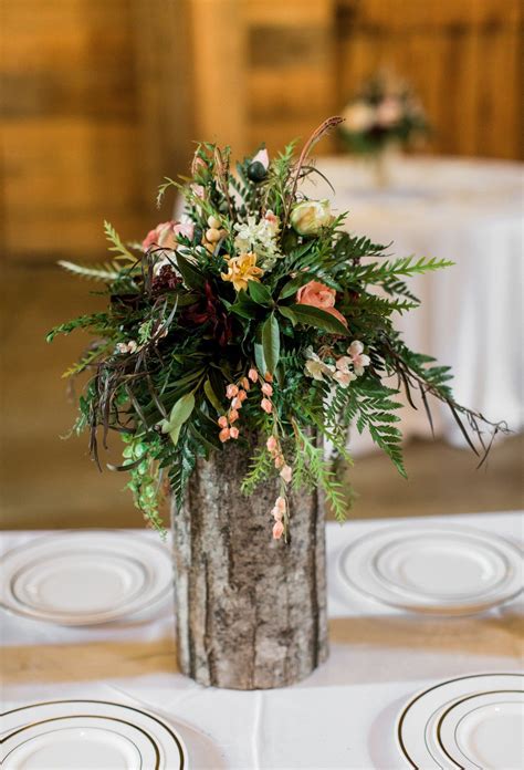 A table with wooden centerpiece may look more enchanting. Rustic centerpieces | Rustic centerpieces, Table ...
