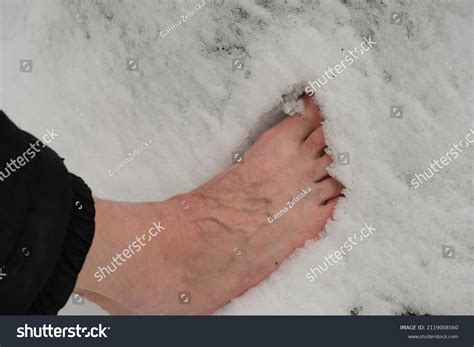 Senior Walks Barefoot On Snow Bare Stock Photo 2119008560 Shutterstock