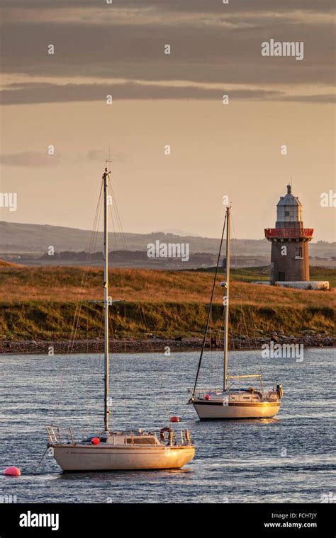 Rosses Point Lighthouse Oyster Island And Two Yachts Moored In The