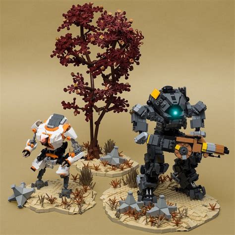 Two Lego Figurines Standing Next To Each Other In Front Of A Small Tree