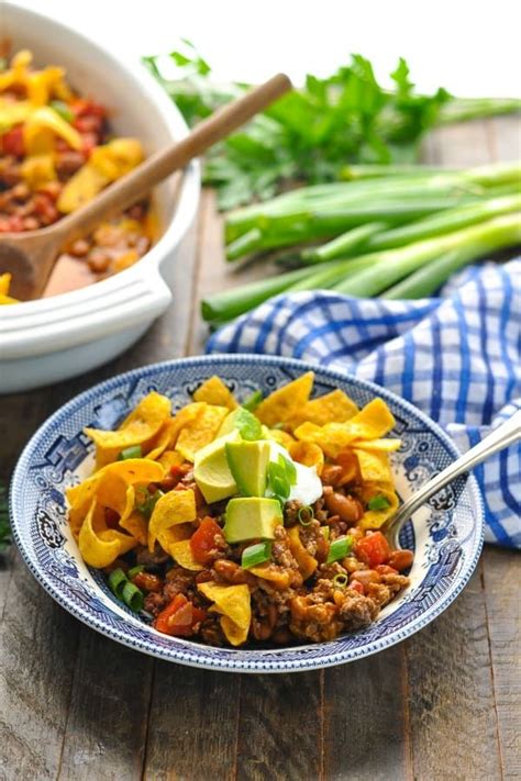 A Cozy Chili Cheese Casserole Topped With Crunchy Corn Chips This