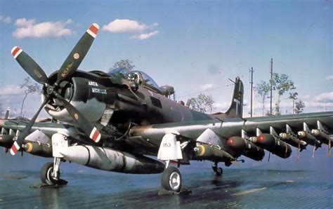 Eyes To The Skies — A Fully Armed A 1h Skyraider At Rest At An