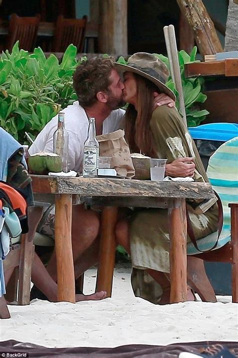My friends call me gerry. Gerard Butler smooches girlfriend Morgan Brown in Mexico ...