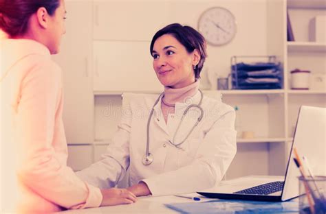 Teenage Girl Visits Doctor In Hospital Stock Image Image Of Checking