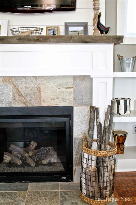 A cozy fire on a cold night is a delight. Shiplap Fireplace with Built-Ins - The Unique Nest