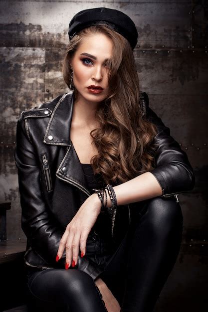 Premium Photo Beautiful Girl Posing On A Leather Jacket