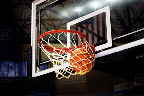 Basketball Going Through Hoop Stock Photo Dissolve