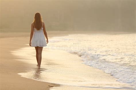 Woman Walking On The Sand Of The Beach Stock Photo Image 45764755