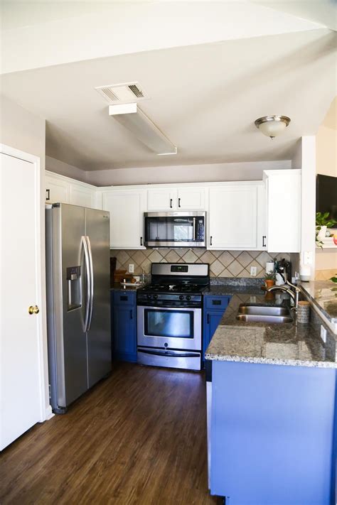 Maybe you would like to learn more about one of these? Our DIY Blue & White Kitchen Cabinets - Love & Renovations