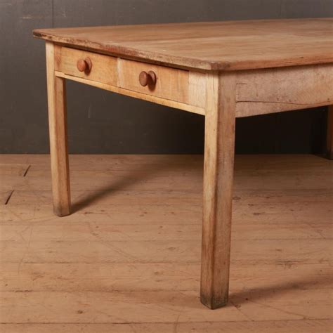 Whether for holidays or for every day, the tactile grain pattern of the wood top offers a nostalgic warmth and organic appeal to any occasion. Large Farmhouse Table For Sale at 1stdibs