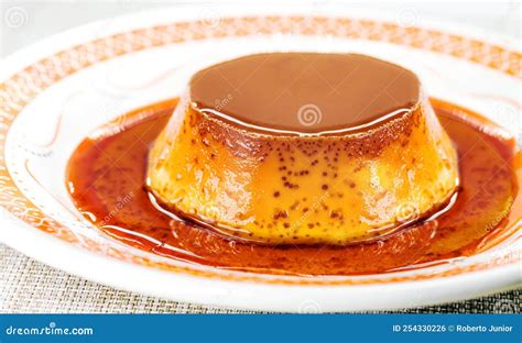 Brazilian Condensed Milk Pudding With Vanilla Syrup Stock Photo