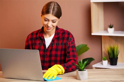 An Employee Of The Cleaning Company Fulfills Orders For Office Cleaning