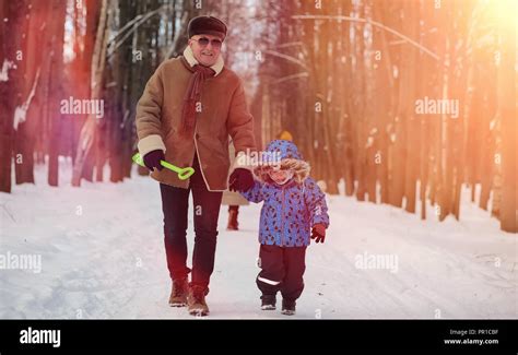 Boy Girl Walking Through Snow Hi Res Stock Photography And Images Alamy
