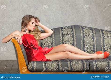Young Woman Sitting On Sofa Stock Image Image Of Beauty Feminine