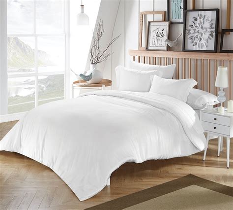 The set features a white geometric pattern, and the fabrics are made from cozy microfiber. White Bamboo Modal King Comforter