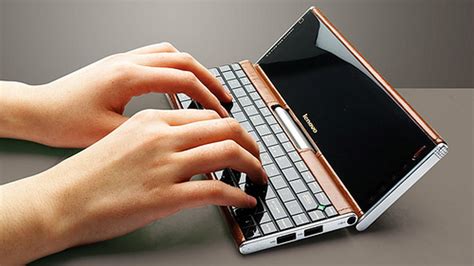 Lenovo Teases Pocket Yoga Mini Laptop Cnet