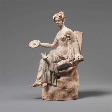 Terracotta Statuette Of Aphrodite Seated On A Rock Greek South