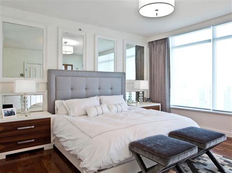A room is never completely finished until you address your window dressing situation. Designer Tricks for Living Large in a Small Bedroom | HGTV