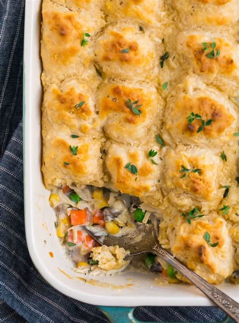 Once the chicken is cooked, layer your casserole. Easy Chicken and Biscuits Casserole. Made with shredded ...