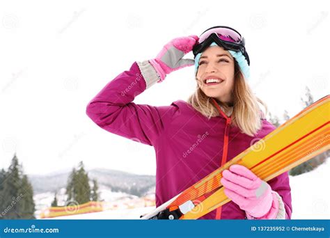 Female Skier On Slope At Resort Stock Photo Image Of Outdoors