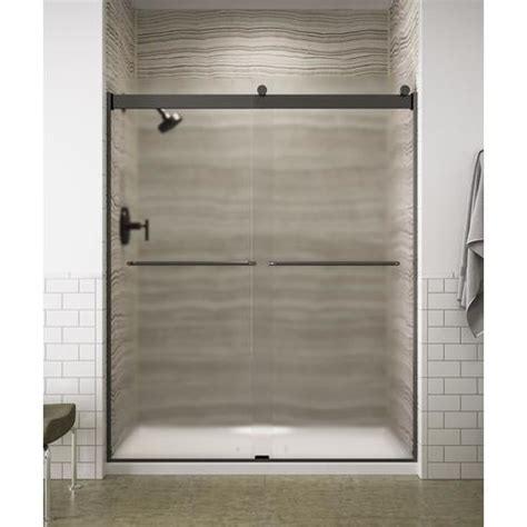This configuration allows you to gaze at your backyard and surrounding landscape without even leaving. KOHLER Levity 74-in H x 56.625-in to 59.625-in W Frameless ...