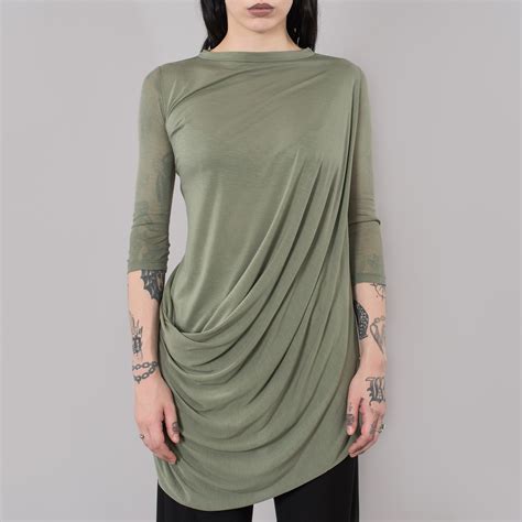 All of its products are made from sustainable materials. AQUA GREEN 3/4 SLEEVES T-SHIRT|wolfensson