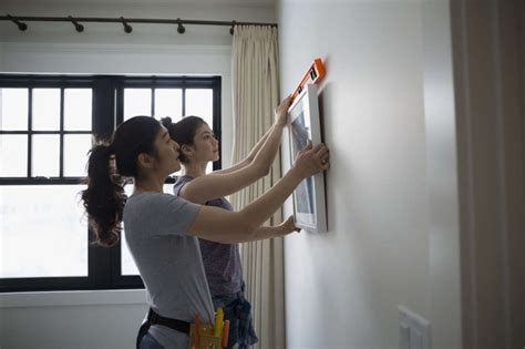 11 Ways To Hang Anything On A Wall In 2021 Laser Levels Hanging
