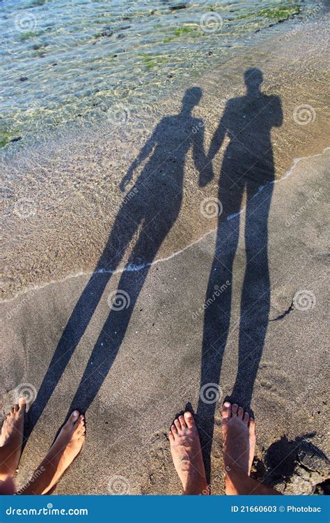 Long Shadow Of Couple Holding Hands Stock Photos Image 21660603