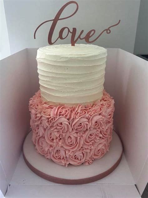 A 2 Tier Buttercream Wedding Cake In Cream Pink And Rose Gold I
