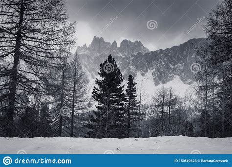 Dramatic Black And White Foggy Snowcapped Peaks Mountain Range In