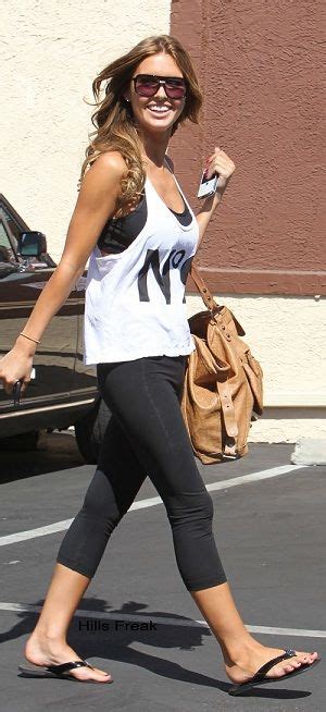 Who Made Audrina Patridge S Black Flip Flops Nude Bag And White Tank Top That She Wore N Los