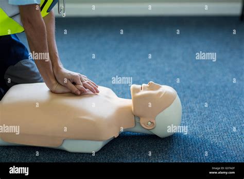 Female Paramedic During Cardiopulmonary Resuscitation Training Stock