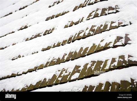 Texture Of Wooden Roof Tiles Covered With Snow Stock Photo Alamy
