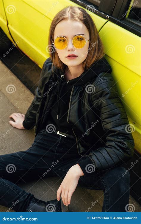 Beautiful Fashionable Teenager Girl In Sunglasses And Leather Jacket