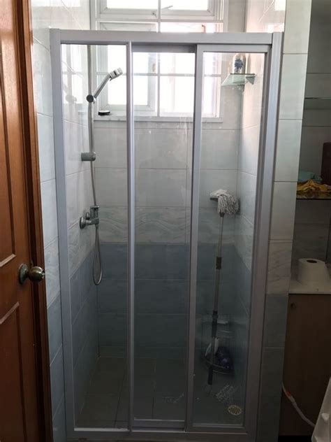The sliding panel sits on rollers within a track and slides behind the fixed panel to allow access. Below Basin Doors & Shower Screens - DOCTOR DOORS DECOR ...