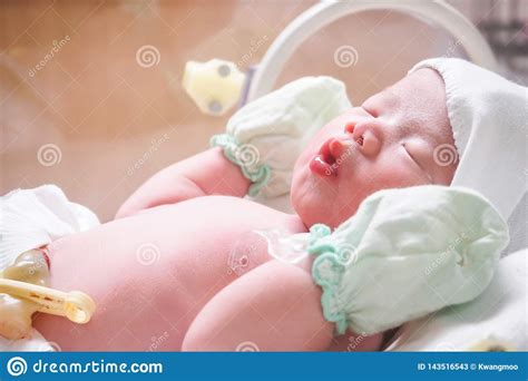 Newborn Baby Girl Inside Incubator In Hospital Room Stock Image Image