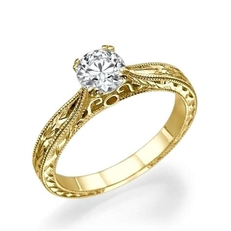 When engraving engagement rings, sentiment plays a huge role, but personality is definitely more important, so skies the limit. Round Diamond Engraved Engagement Ring in 18k yellow gold