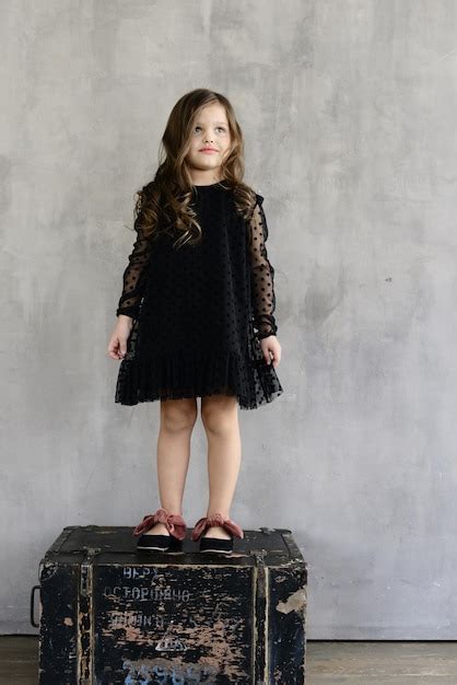 Premium Photo Stylish Little Girl In Black Dress