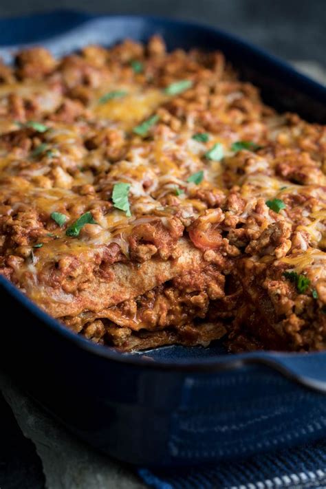 Remove from heat and stir in shredded chicken. Layered chicken enchilada casserole | Recipe | Enchilada ...