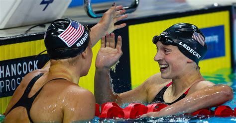 michael phelps claims gold katie ledecky earns another world record