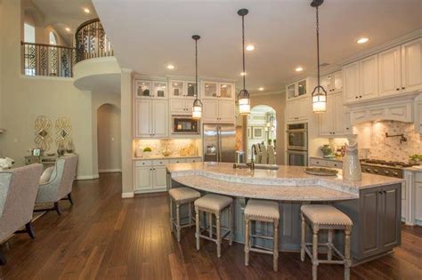 If the kitchen is in an open plan space, it means you need two safety gates to keep babies and toddlers from making their way into the kitchen. Beautiful kitchen | Round kitchen island, Curved kitchen ...
