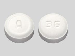White circle black shape, circle, white, symmetry png. A 36 Pill Images (White / Round)