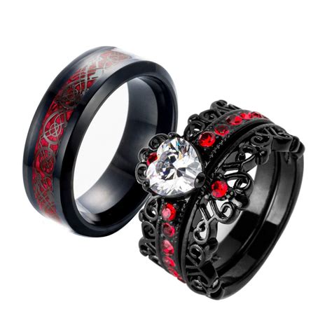 Two Black Rings With Red Crystals On Them